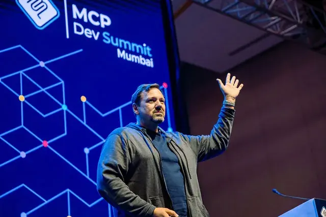 Conference photographer covering an MCP Dev keynote in Mumbai