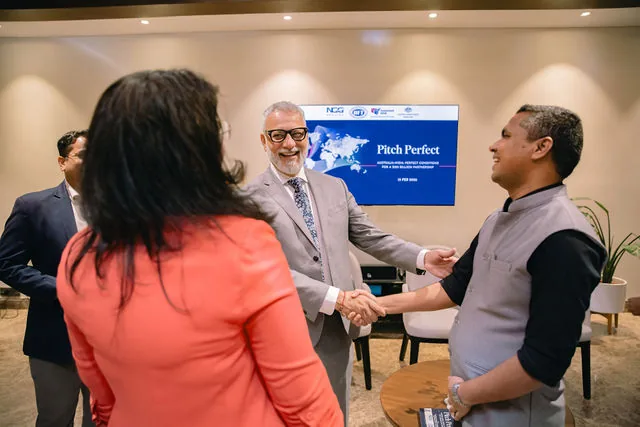 Guests at a branded corporate launch event