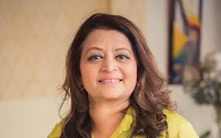 Creative C-suite portrait in a personal environment