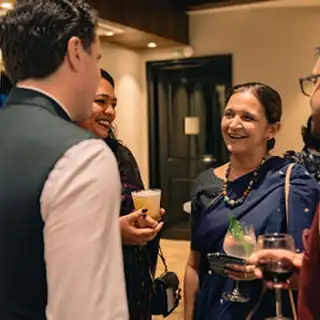 Hotel Event Photographer Mumbai Active cocktail networking between international guests