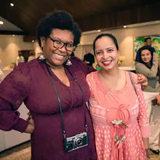 Hotel Event Photographer Mumbai Warm candid moment between film-reception guests