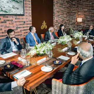 Jio World Convention Centre Event Photographer Leadership networking between summit sessions