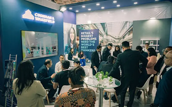 NESCO Bombay Exhibition Centre Trade Show Photography Cushman & Wakefield exhibition presence with visitors